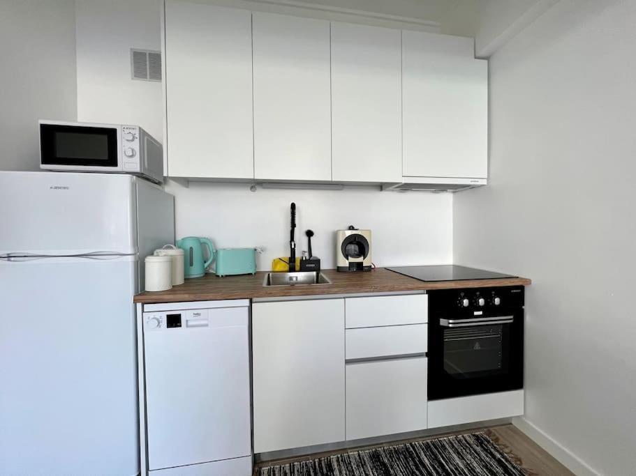 Apartamento Muito Central - 300 Metros Da Praia Lägenhet Costa de Caparica Exteriör bild